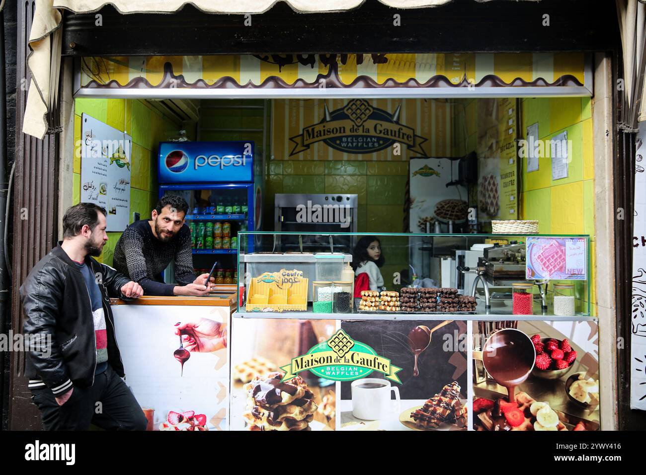 Damascus, Syria. 09 December 2024. An open waffle shop in the city of ...