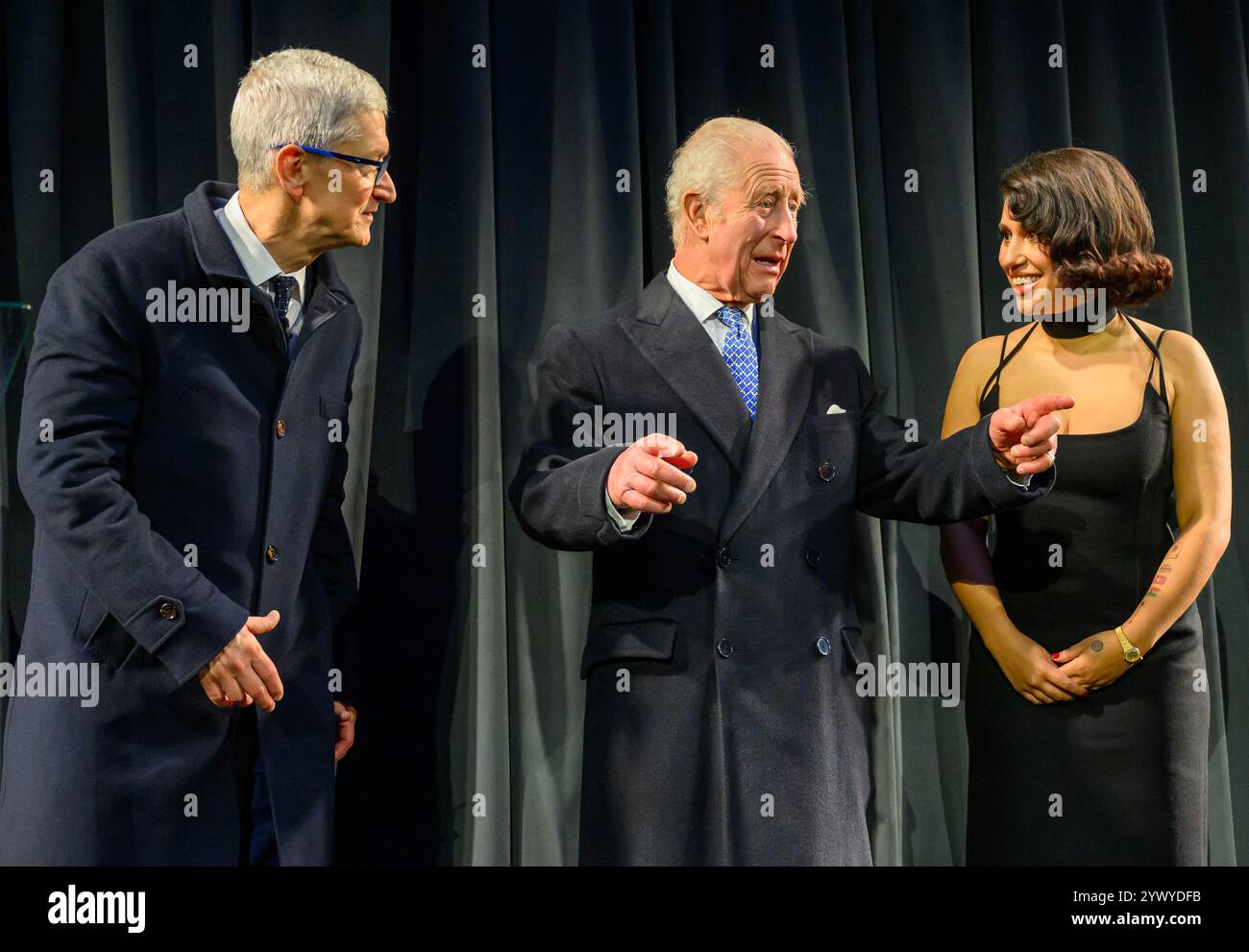 Tim Rayee King Charles III (centre) with chief executive of Apple, Tim Cook and ...