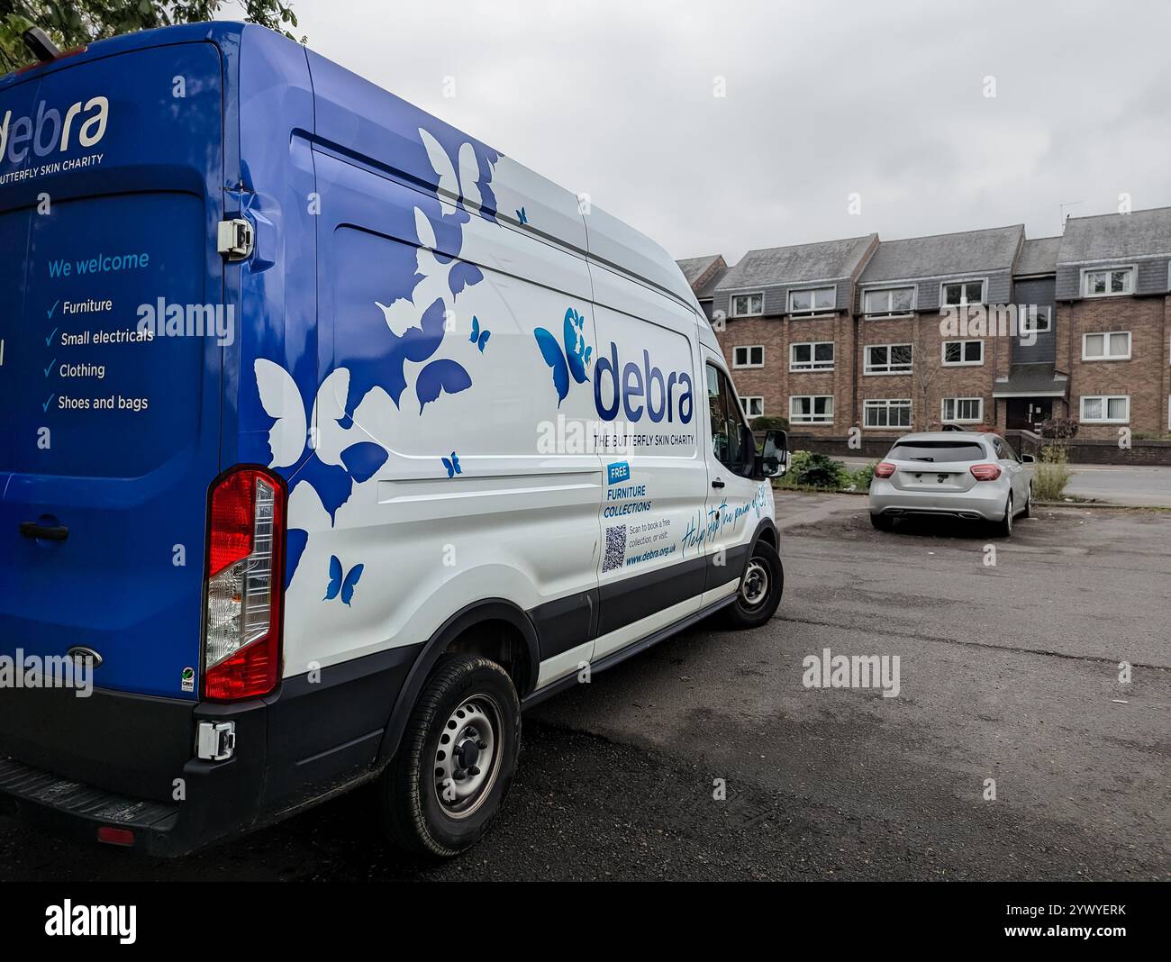 Debra - The Butterfly Skin Charity donations pick-up van - rear 3/4 view - Smartphone Captured Stock Image