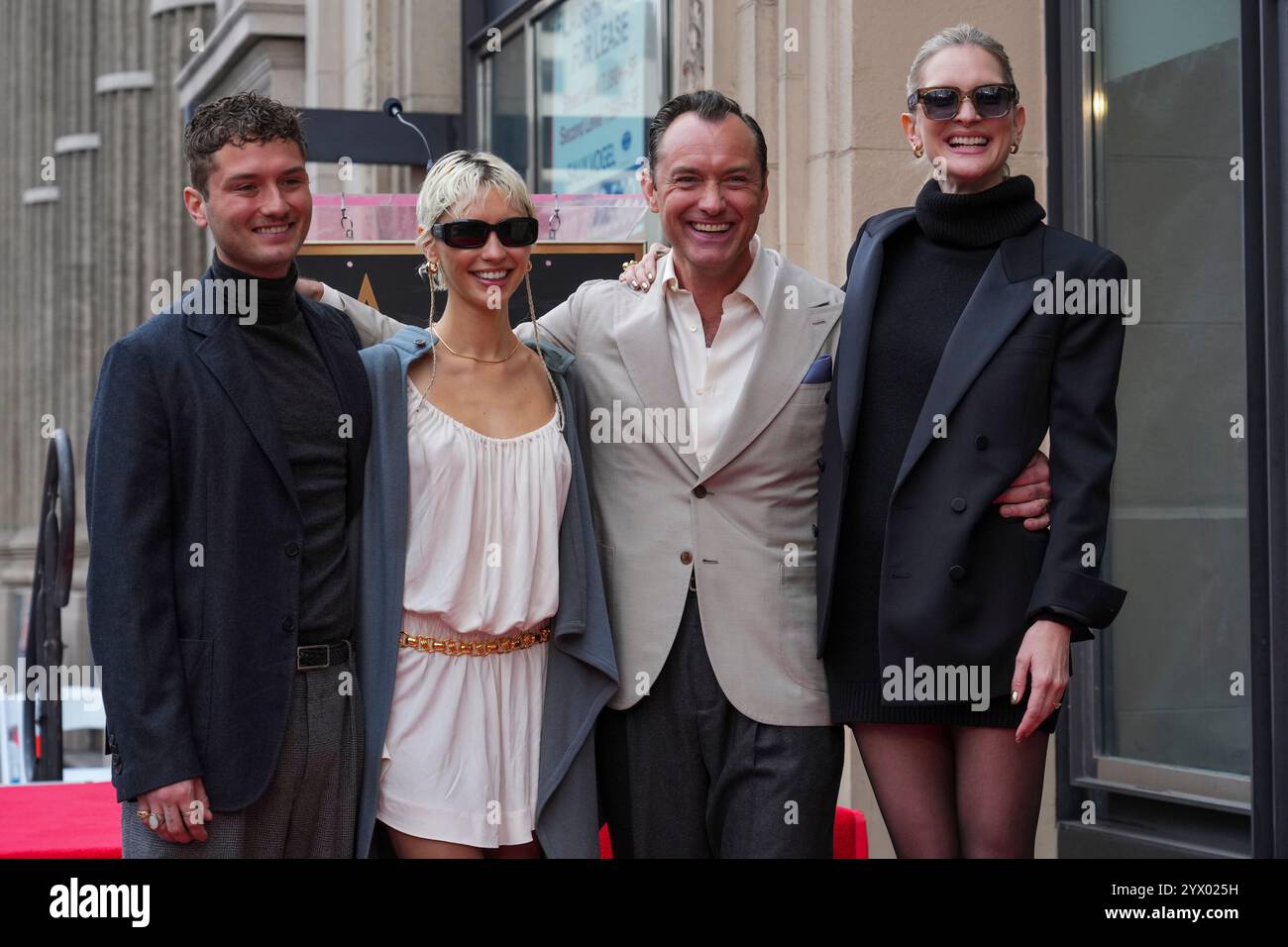 Raff Law, from left, Iris Law, Jude Law, and Phillipa Coan pose with ...