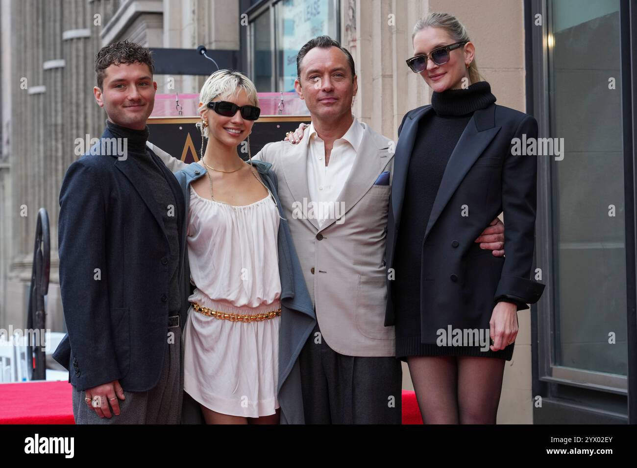 Raff Law, from left, Iris Law, Jude Law, and Phillipa Coan pose with ...