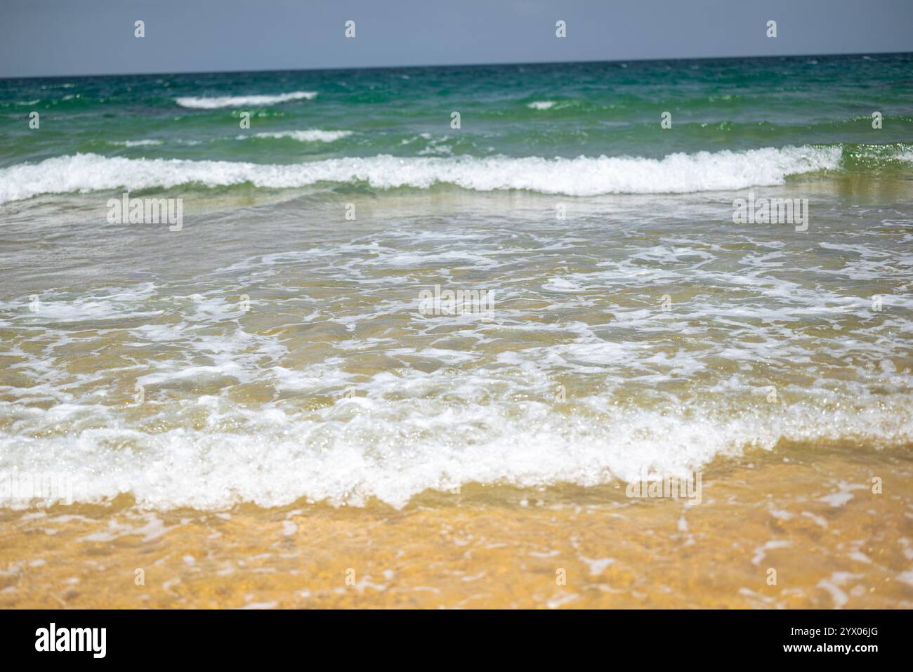 Peaceful ocean waves on sandy hi-res stock photography and images - Alamy