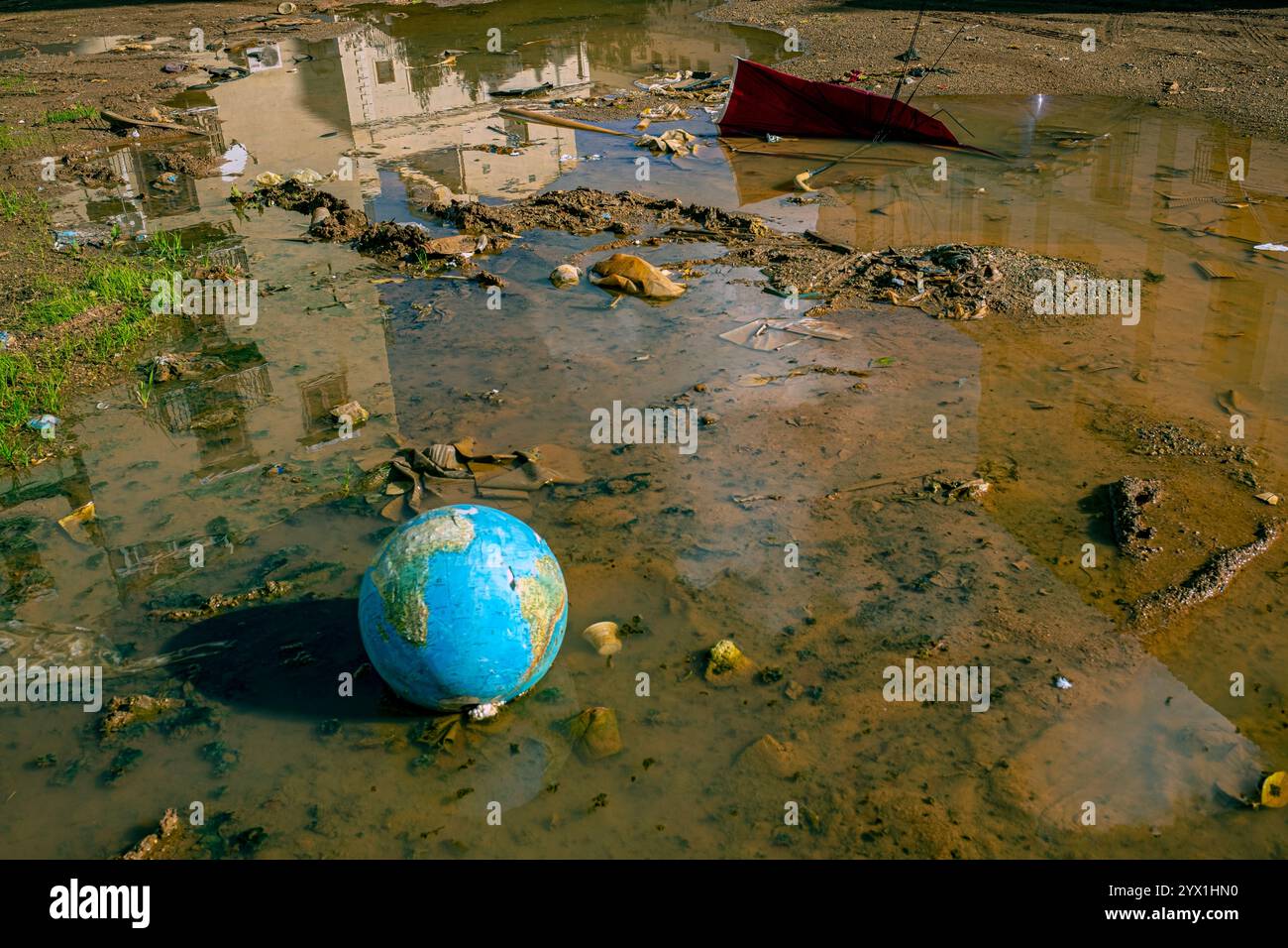 Abandoned Globe Reflecting Environmental Neglect in Polluted Landscape ...