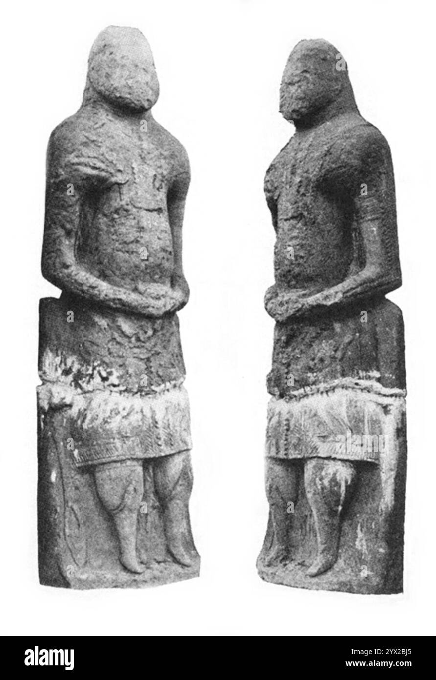 Cuman-Qıpčaq warrior-statue with musical instrument carved at its feet (left). Stock Photo