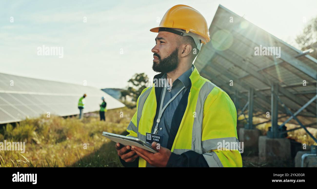 Solar panel, thinking and man with tablet, inspector and network with problem solving. Quality control, environment or employees in field, tech and Stock Photo