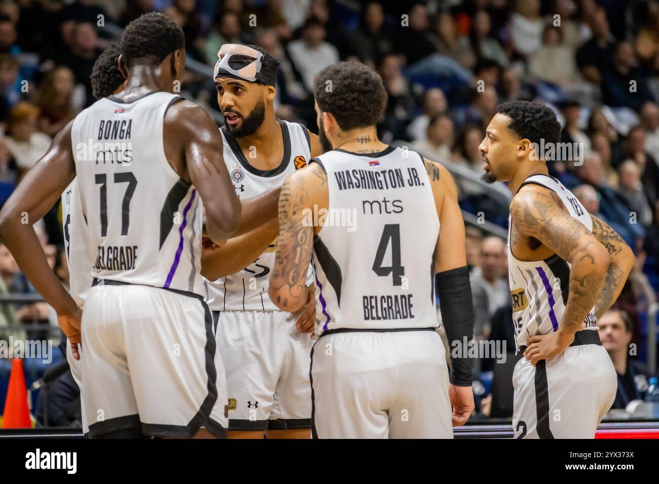 Berlin, Germany. 12th Dec, 2024. Brandon Davies (0) of Partizan Belgrade seen during the Turkish Airlines EuroLeague basketball match between ALBA Berlin and Partizan Mozzart Bet Belgrade at the Uber Arena in Berlin. Credit: Gonzales Photo/Alamy Live News Stock Photo