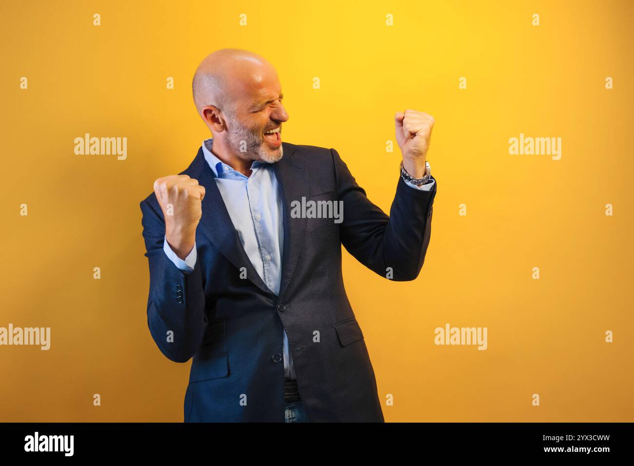 Raises arms in joy hi-res stock photography and images - Alamy