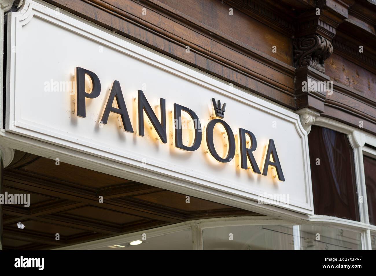 Close up view of a Pandora jewellery sign on the front of a UK shop. Stock Photo