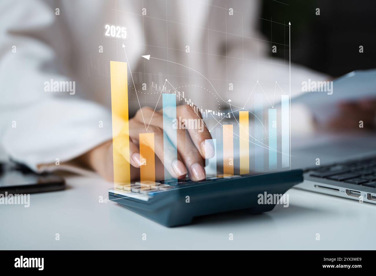 Business Professional Analyzing Financial Data with Calculator and ...