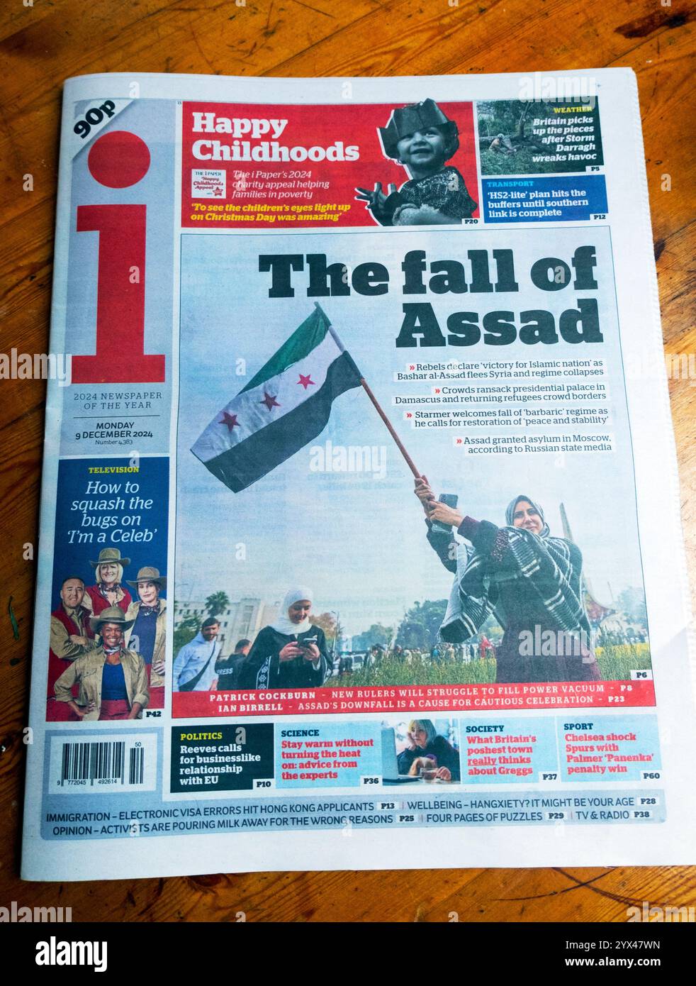 'The fall of Assad' i newspaper headline front page Syria President Bashar al-Assad escapes to Moscow Russia article 9 December 2024 London England UK Stock Photo