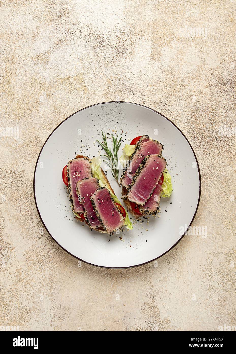 Fillet Breakfast Sandwiches with fried tuna fillet, sesame, breakfast, top view ...