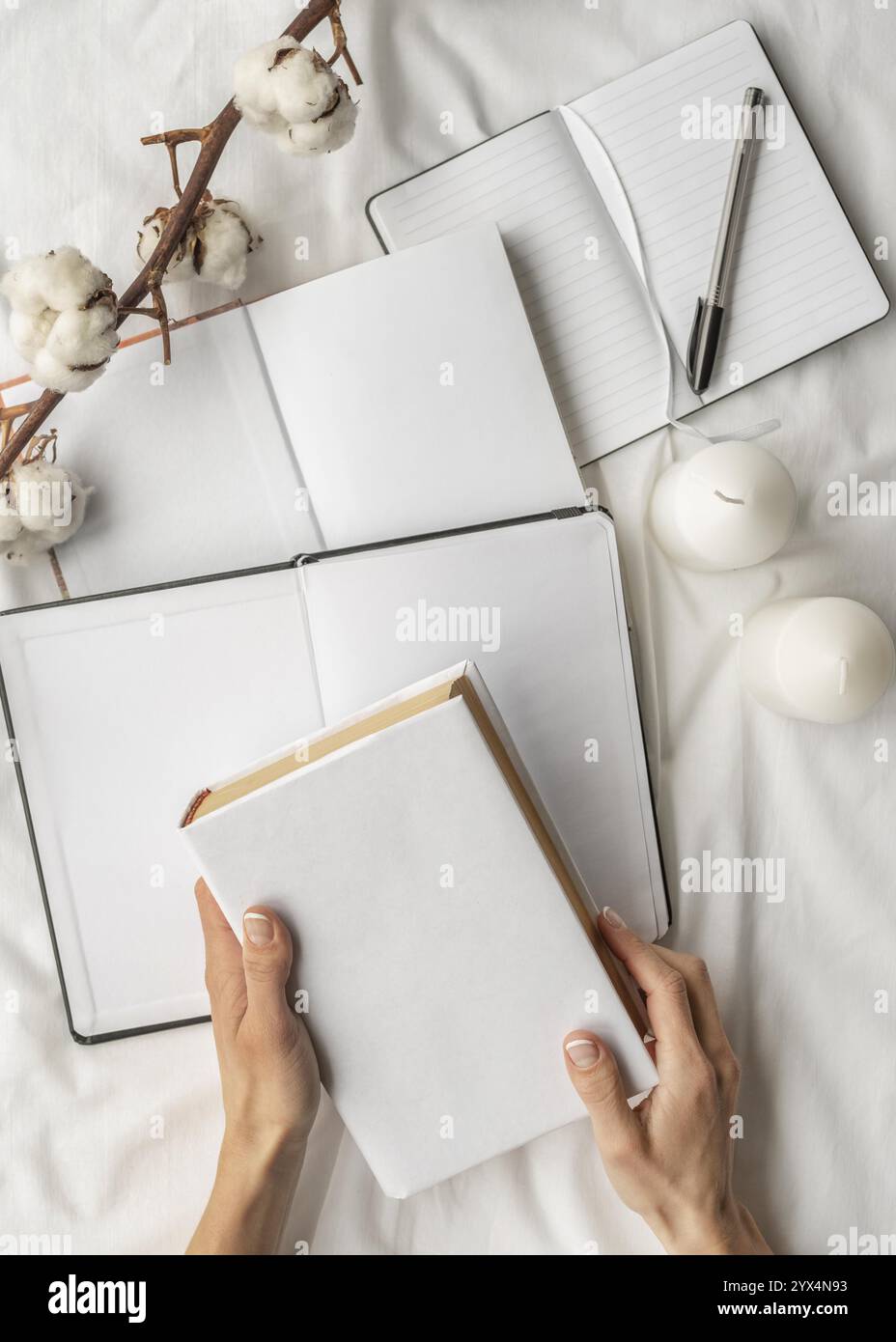 View notebooks cotton arrangement Stock Photo - Alamy