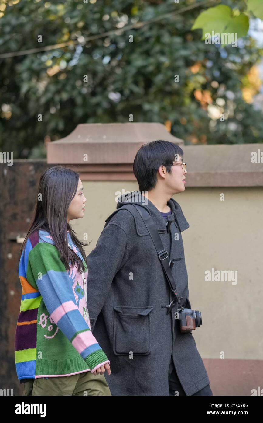 Young asian couple walks hi-res stock photography and images - Alamy