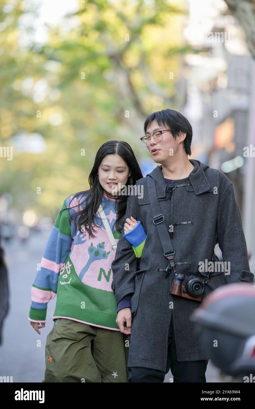 Young asian couple walks hi-res stock photography and images - Alamy