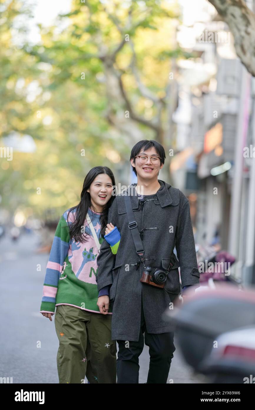 Young asian couple walks hi-res stock photography and images - Alamy