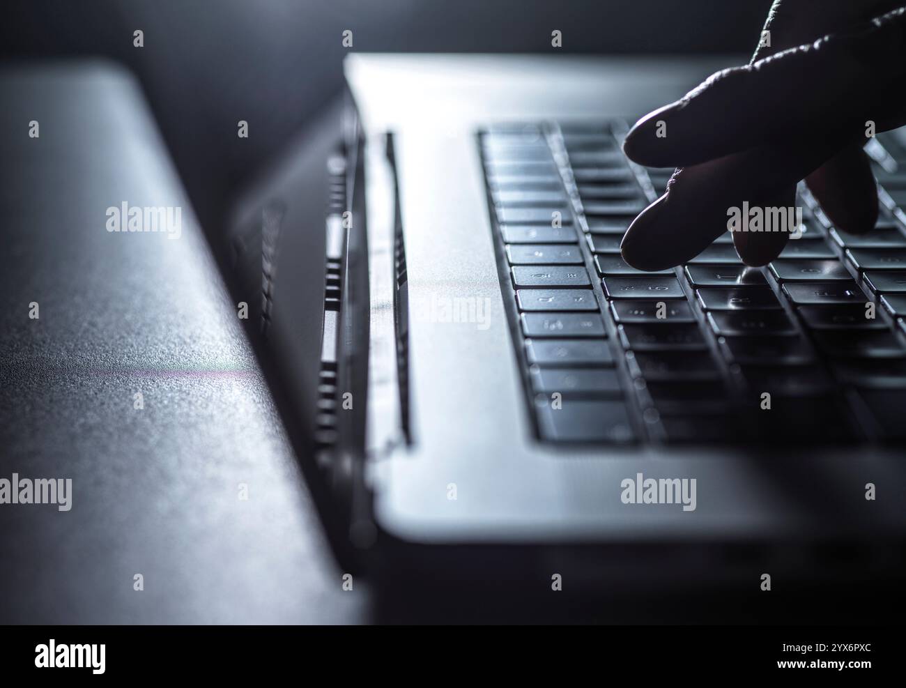 Man working on a laptop computer. Stock Photo