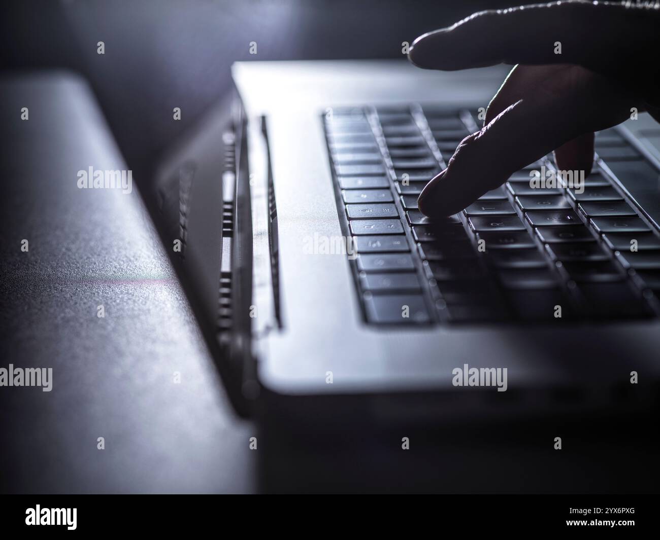 Man working on a laptop computer. Stock Photo