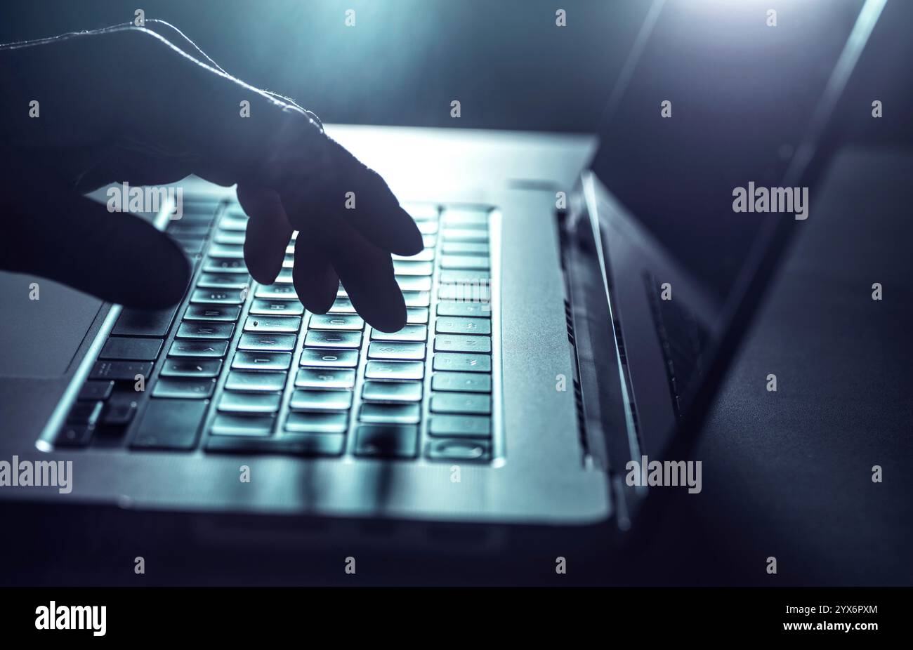 Man working on a laptop computer. Stock Photo