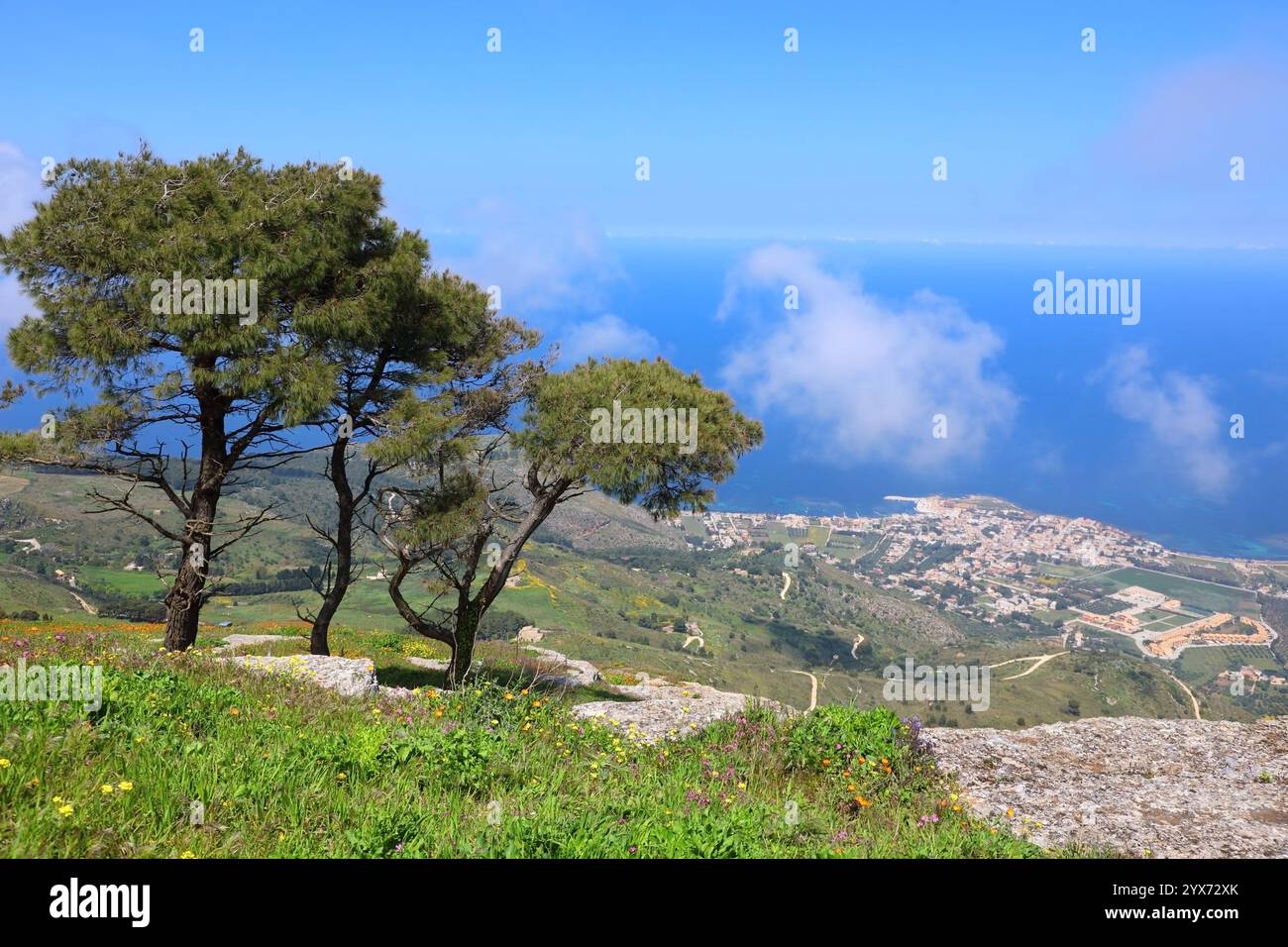 Ravishing spring landscape of Sicilian nature with clouds passing by trees Stock Photo