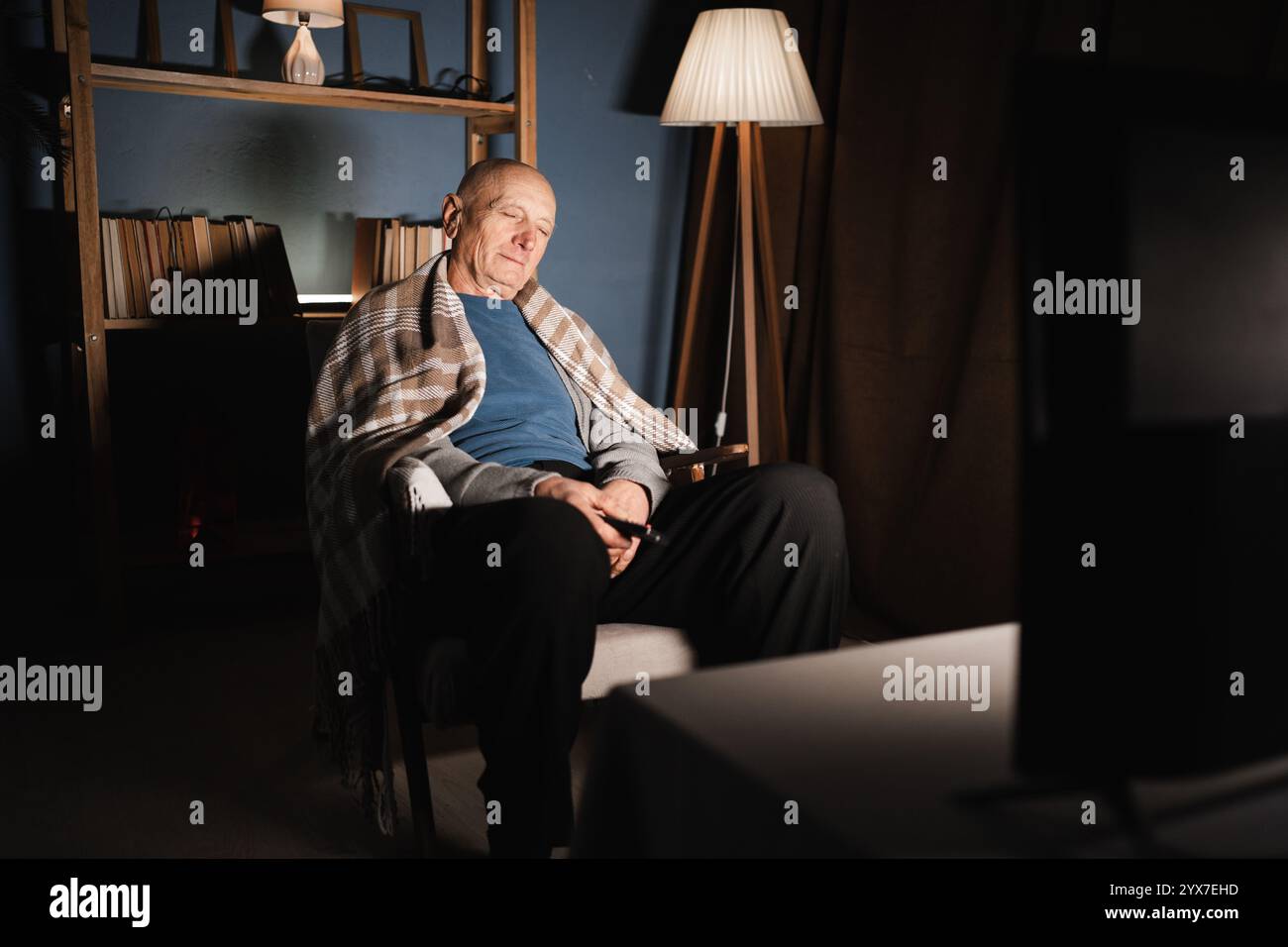 Old man sleeping in armchair hi-res stock photography and images - Alamy