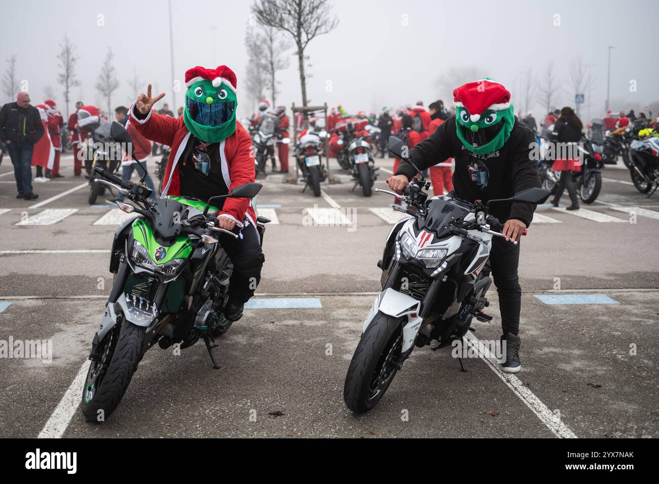 Madrid, Spain. 14th Dec, 2024. Motorcyclists dressed as Santa Claus gathered to ride to Valencia. Around 400 bikers are traveling to Valencia to deliver Christmas gifts to the children affected by the floods of the last natural disaster in Valencia region the past October, that caused after an intense storm system known as 'Dana' more than 200 deaths in the biggest natural disaster in Spain's recent history. Credit: Marcos del Mazo/Alamy Live News Stock Photo