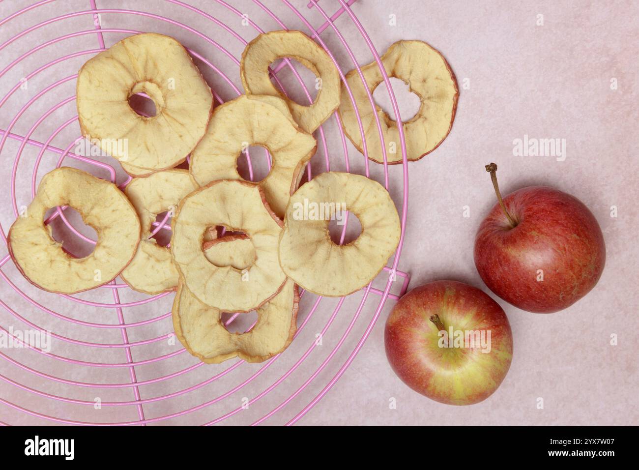 Dried apple rings and apples, dried fruit Stock Photo