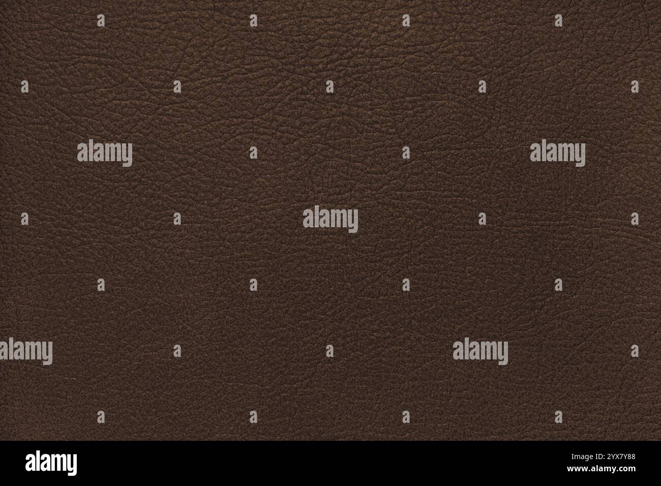 Natural, genuine solid brown leather texture close up, macro. Structure of matte leatherette, artifical skin surface with embossing pattern. Backgroun Stock Photo