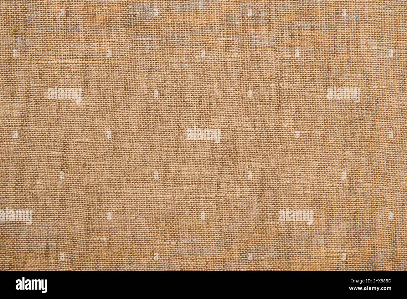 Beige linen fabric texture closeup as textile background Stock Photo