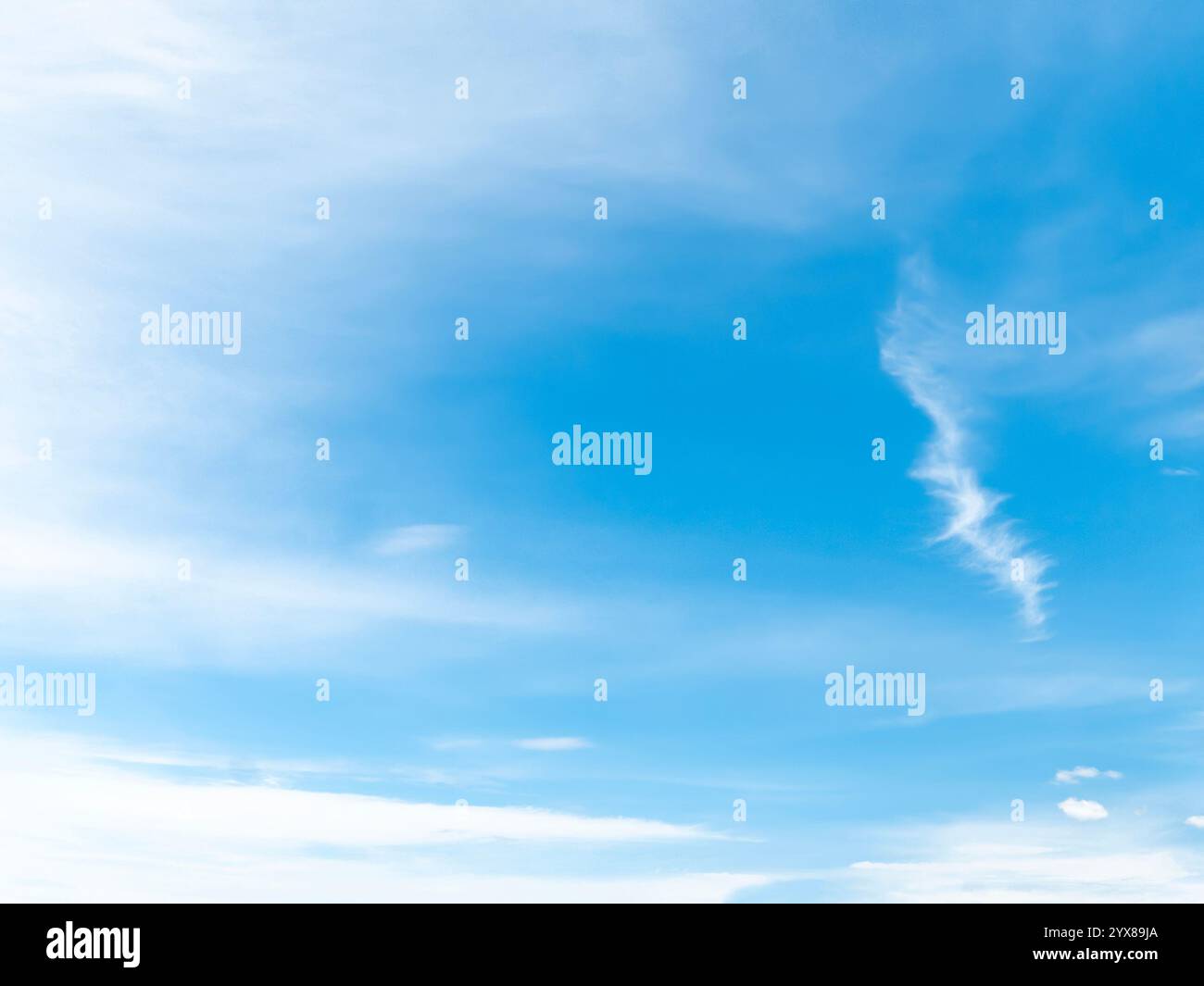 Blue sky with white stratus clouds in summertime Stock Photo - Alamy