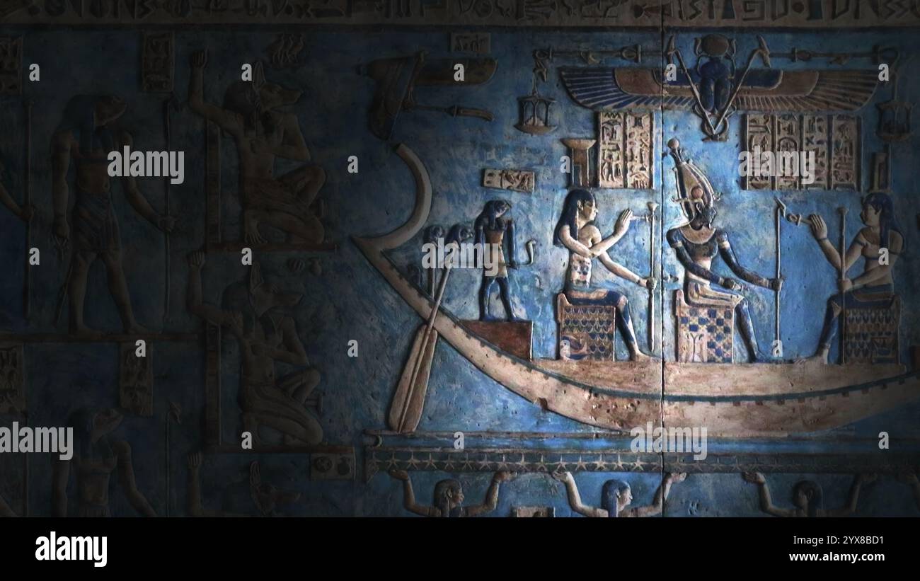 Hieroglyphic carvings and paintings on wall Stock Photo - Alamy