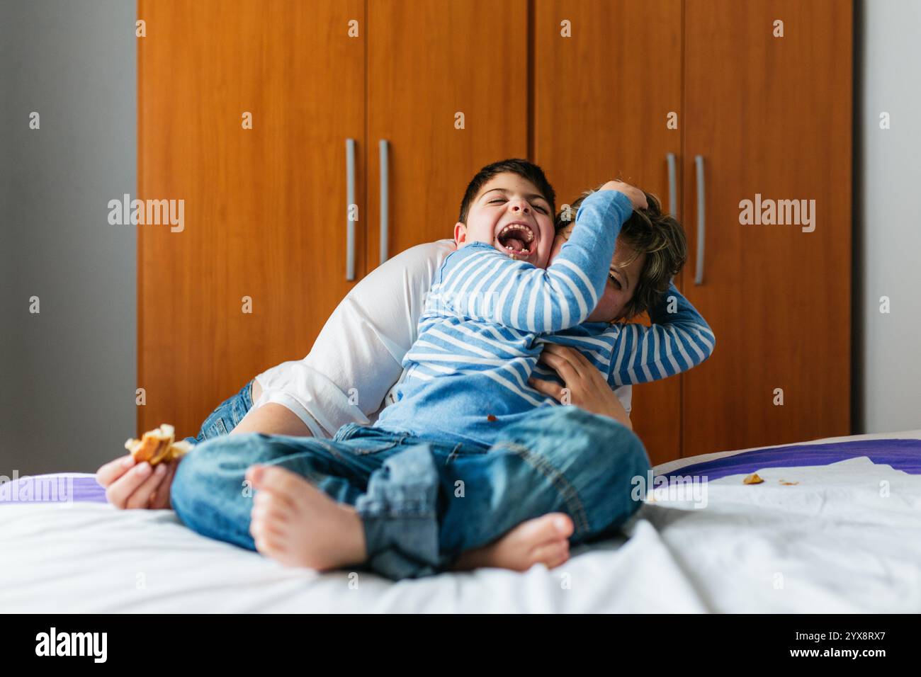Mother And Son With Disability Playing Together On Bed Stock Photo Alamy mother-and-son-with-disability-playing-together-on-bed-stock-photo-alamy