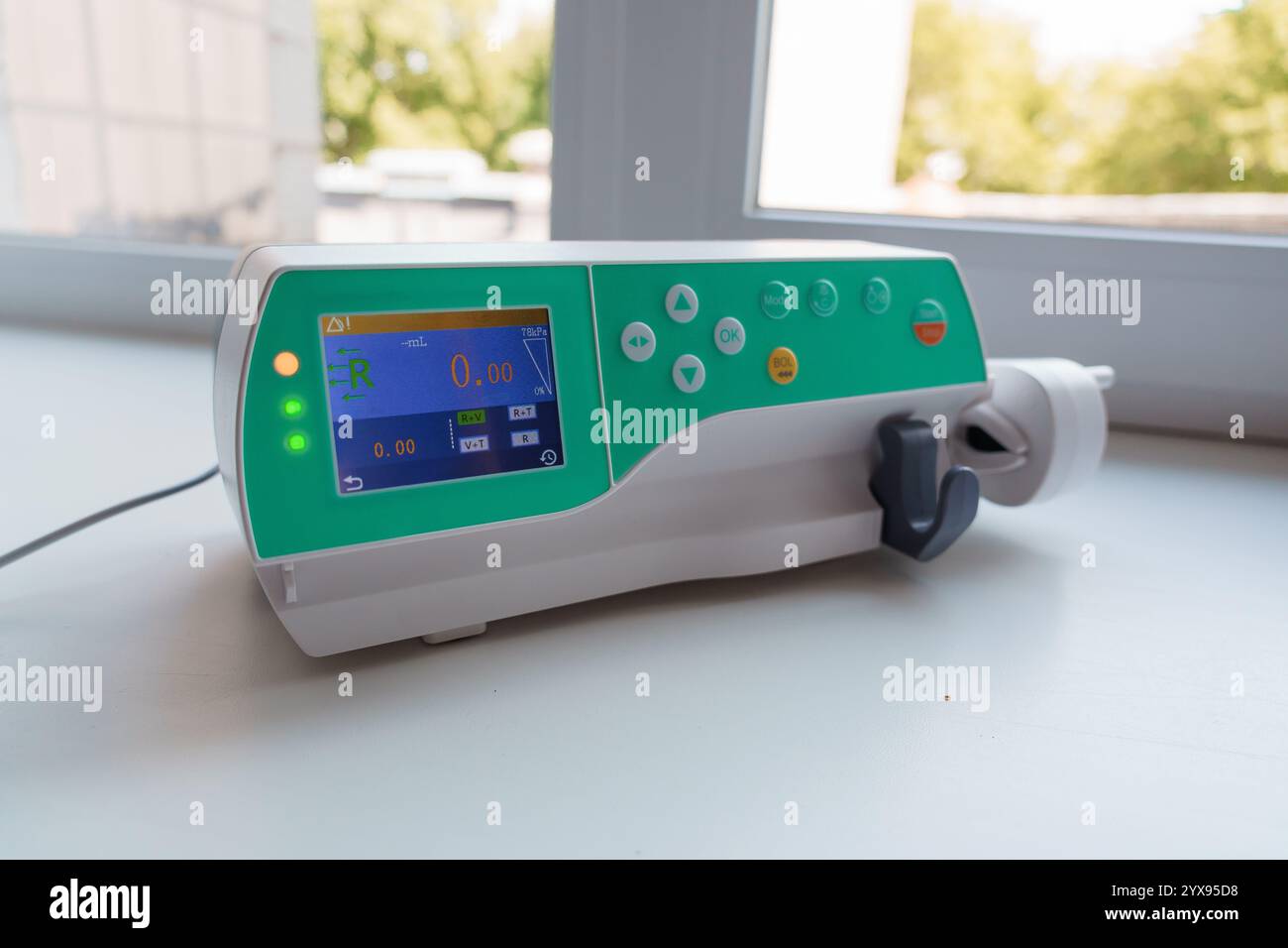 Modern Medical Device Displaying Calibration Readings with Green and White Design. Stock Photo
