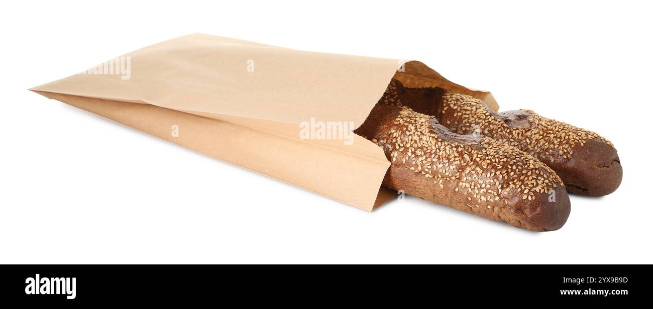 Fresh baguettes with sesame in paper bag isolated on white Stock Photo ...
