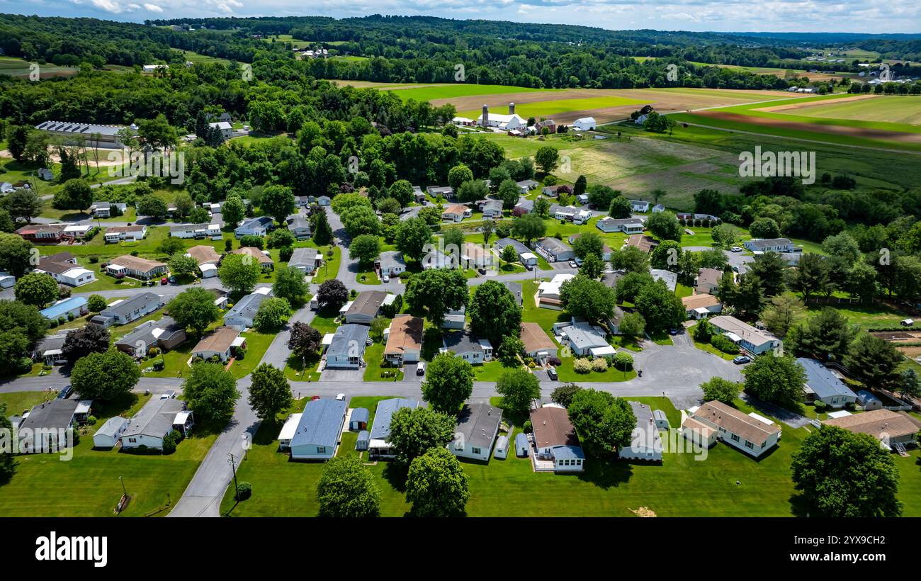 Aerial view of a tranquil rural community featuring various Mobile ...