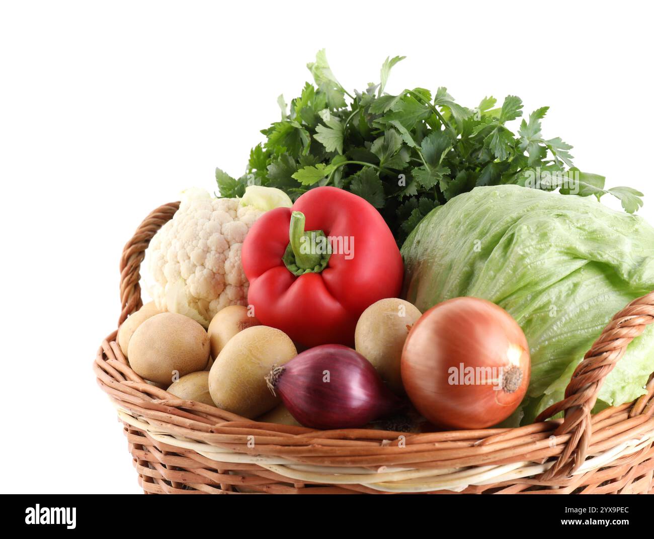 Different ripe vegetables in wicker basket isolated on white Stock ...