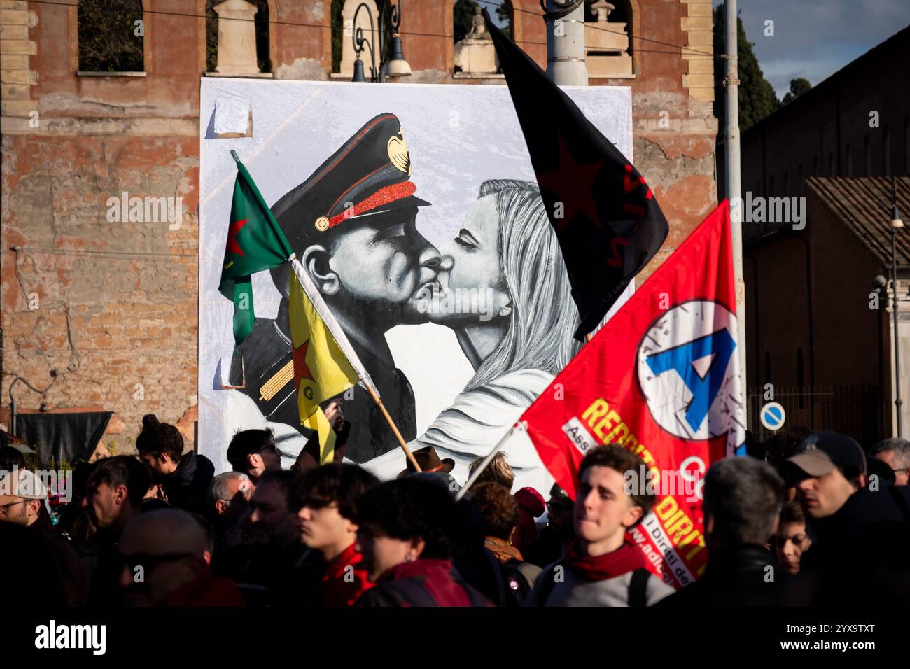 Rome, Italy. 14th Dec, 2024. A billboard shows a kiss between Meloni