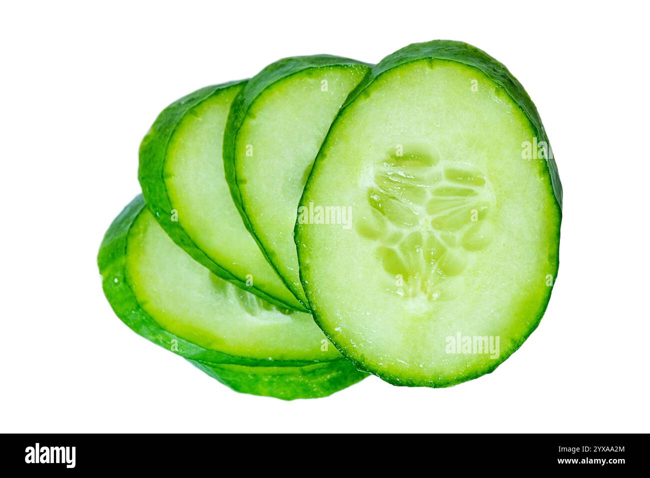 Thinly sliced cucumber isolated on white Stock Photo