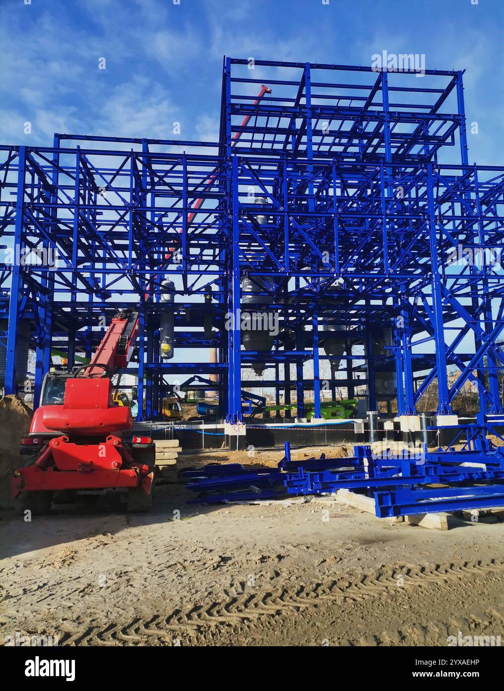 Steel structure is under construction on the construction site against ...