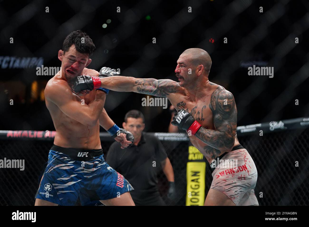 Tampa, Florida, United States. 15th Dec, 2024. TAMPA, FL -DECEMBER 15:Cub Swanson and Billy Quarantillo meet in the octagon for a 3-round featherweight bout during UFC Fight Night - Covington vs Buckley at Amalie Arena on December 15, 2024 in Tampa, Florida (Photo by Jordan Herald/PxImages) Credit: Px Images/Alamy Live News Stock Photo