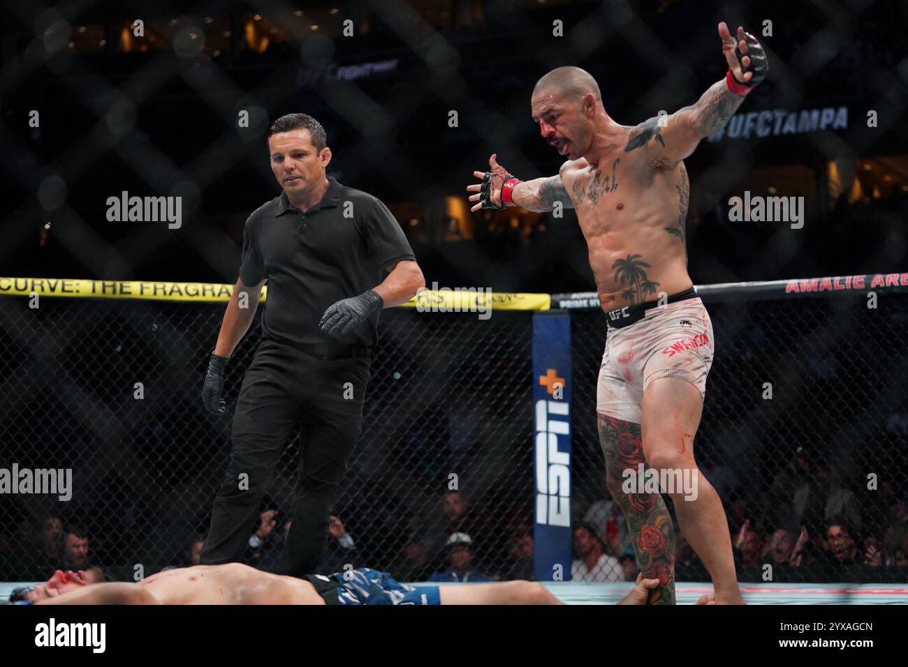 Tampa, Florida, United States. 15th Dec, 2024. TAMPA, FL -DECEMBER 15:Cub Swanson and Billy Quarantillo meet in the octagon for a 3-round featherweight bout during UFC Fight Night - Covington vs Buckley at Amalie Arena on December 15, 2024 in Tampa, Florida (Photo by Jordan Herald/PxImages) Credit: Px Images/Alamy Live News Stock Photo