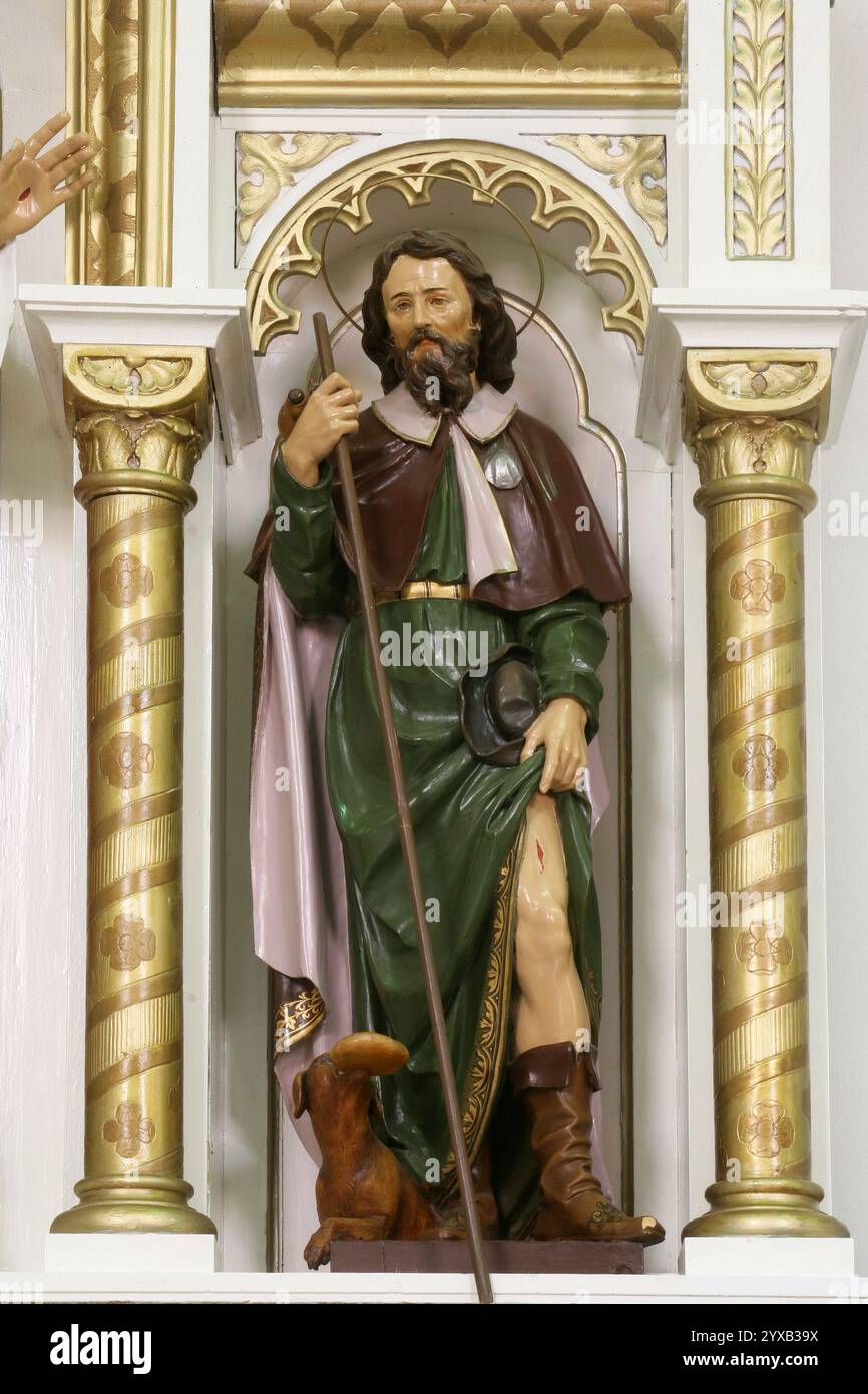 Saint Roch, statue on the altar of the Sacred Heart of Jesus in the ...