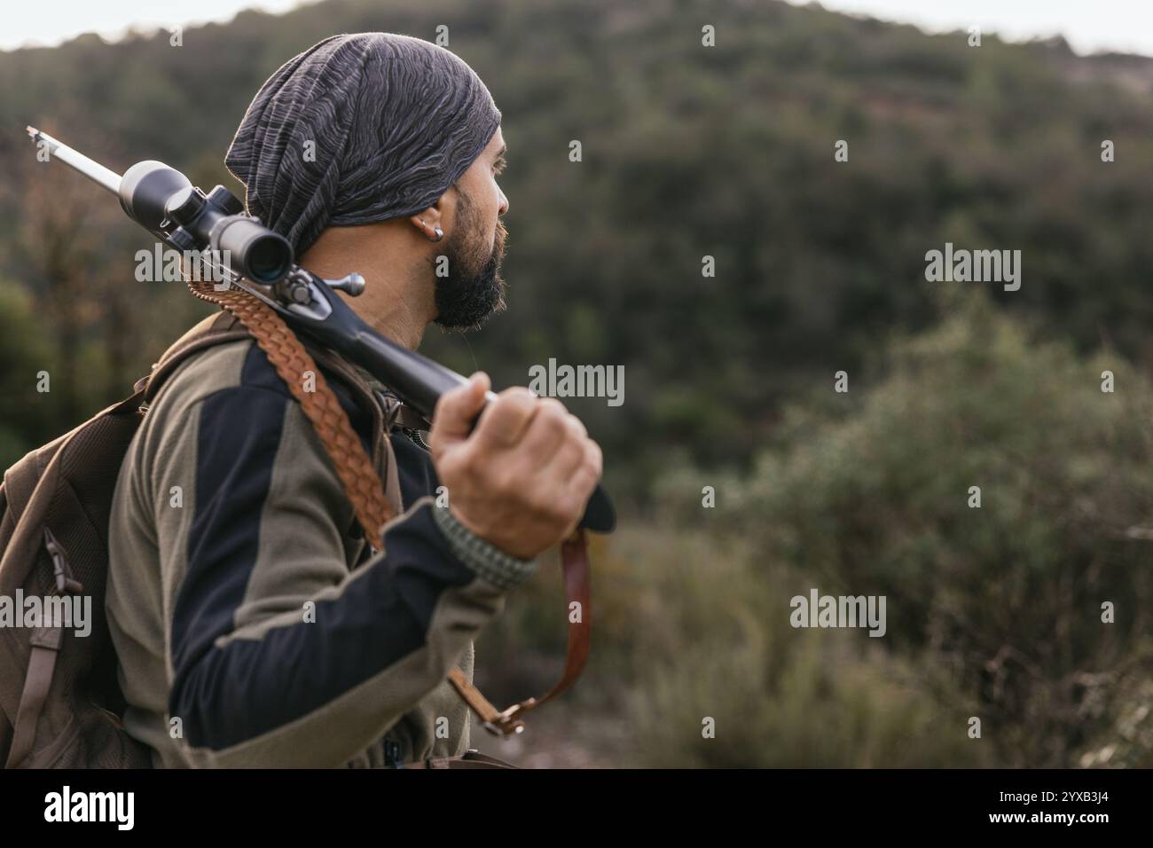 Hunter walking through woods hi-res stock photography and images - Alamy