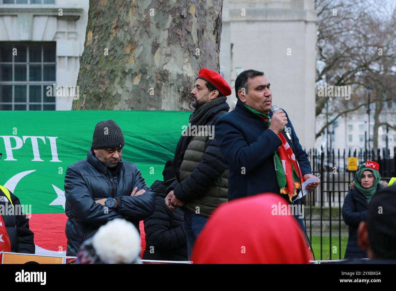 London, UK. 15 December 2024. Activists associated with Pakistan Tehreek-e-Insaf (PTI), the political party of former Pakistani Prime Minister Imran Khan, protest in Whitehall opposite Downing Street in London. Protesters condemn the ongoing violence in Pakistan and clashes between supporters of former Prime Minister Khan and Pakistani security forces. Credit: Waldemar Sikora / Alamy Live News Stock Photo