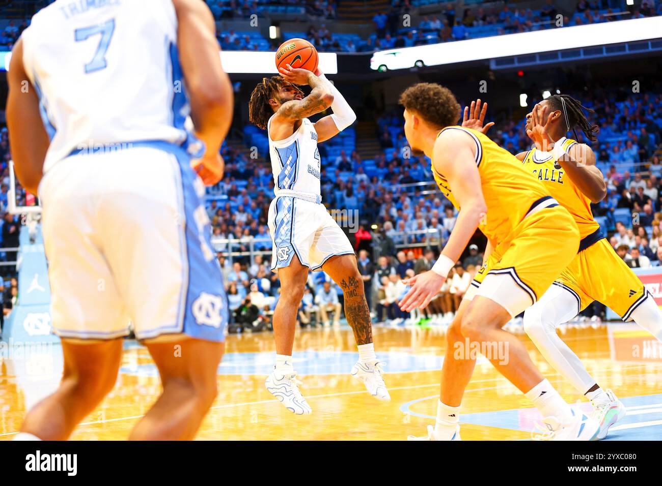 December 14, 2024: North Carolina senior RJ Davis (4) take a jumper ...
