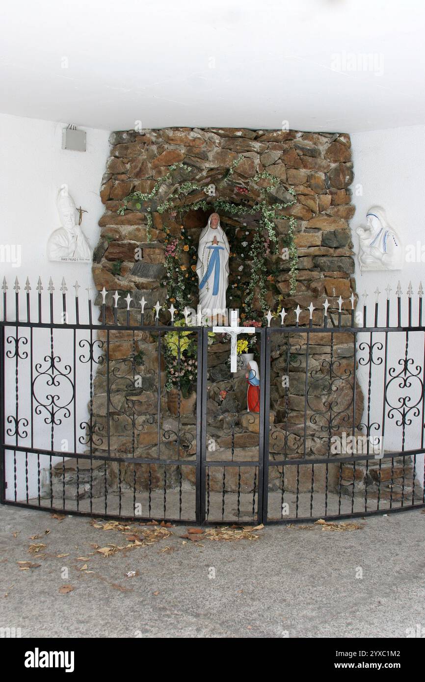 Grotto of Our Lady of Lourdes in Church of Saint Nicholas Tavelic in Slavonski Brod, Croatia Stock Photo