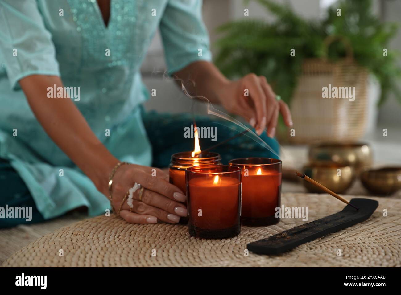 Young chinese woman burning incense hi-res stock photography and images ...