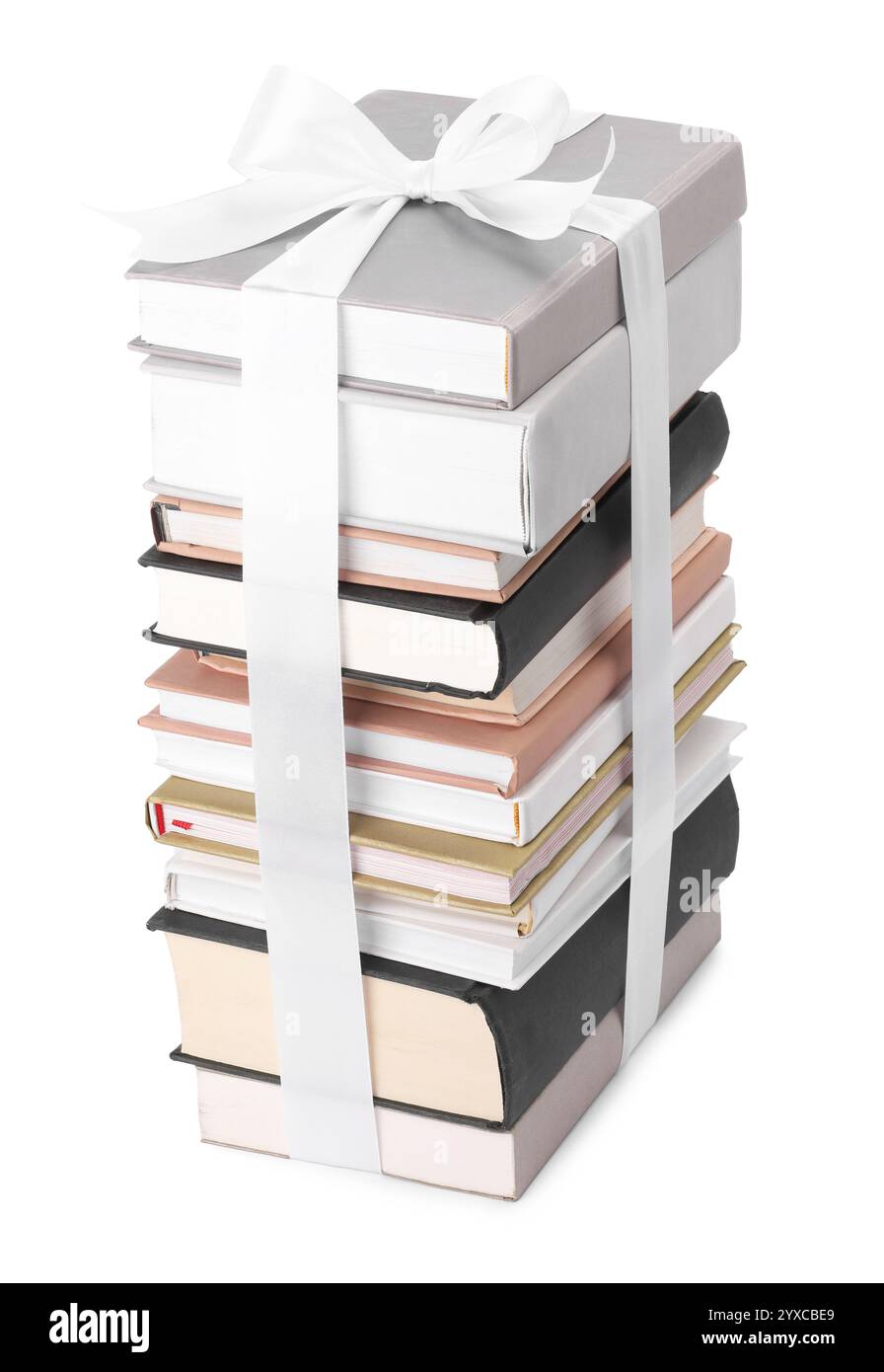 Stack of books with silk ribbon as gift isolated on white Stock Photo ...
