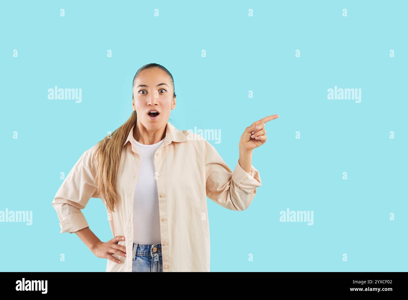 Proud woman pointing finger hi-res stock photography and images - Alamy
