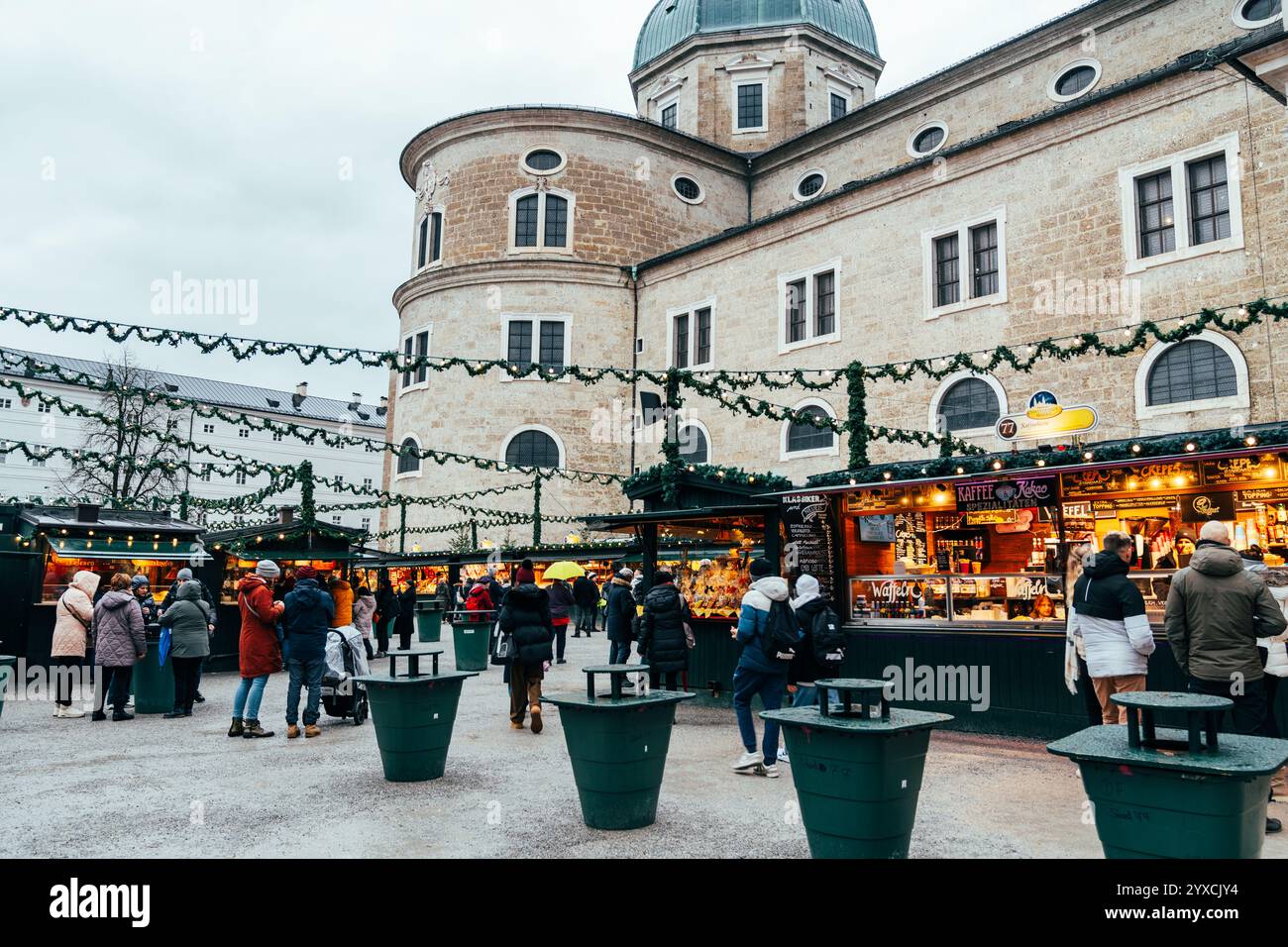 Salzburg, Austria - November 28, 2024: Christmas market booths and stalls at Cathedral Square - famous Christkindlmarkt date back to the late 15th cen Stock Photo