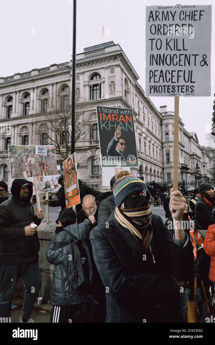 London, UK. 15th Dec, 2024. Demonstrators assemble outside Downing ...